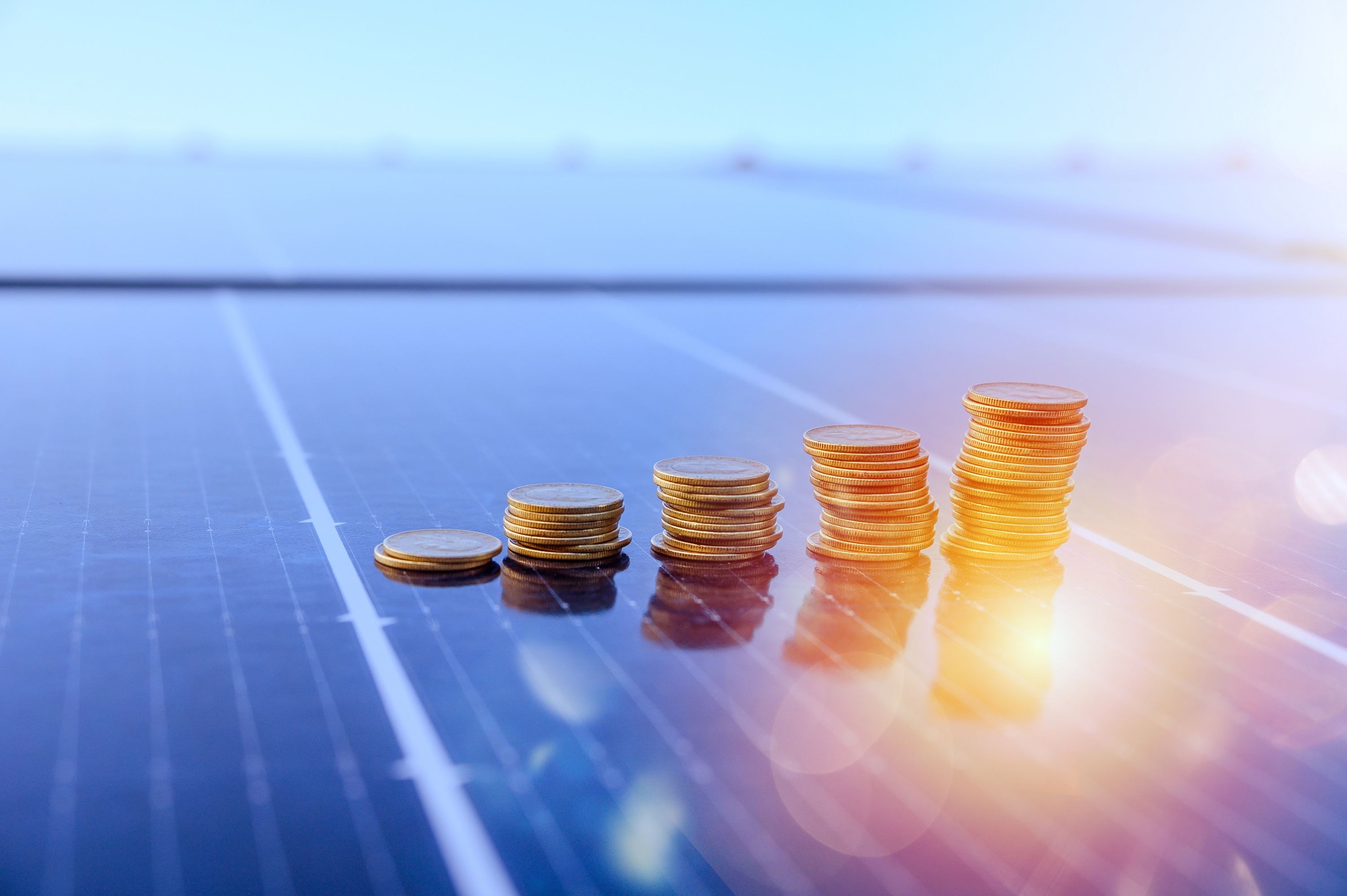 solar panels and coins